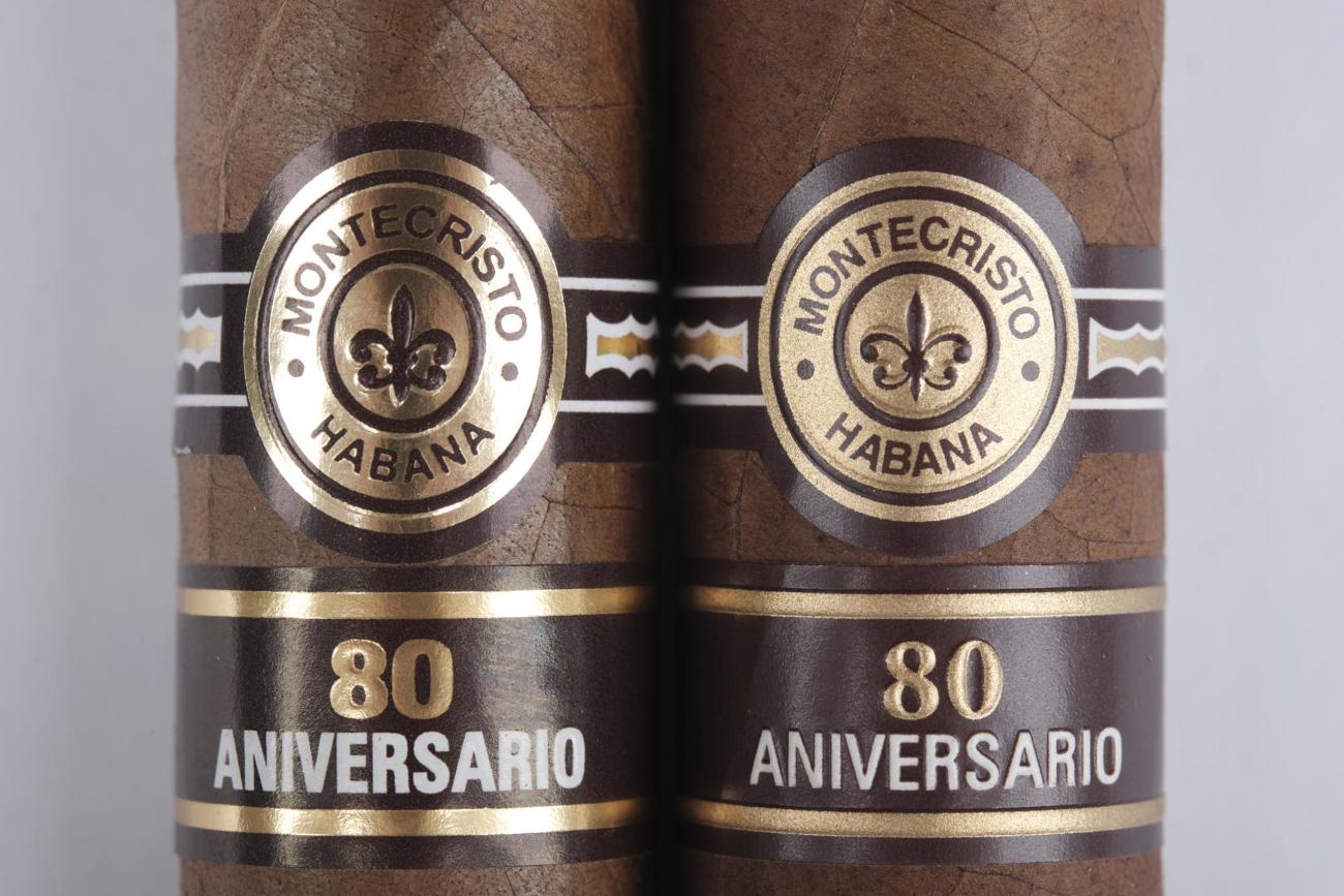 Die echte Montecristo (rechts) unterscheidet sich in Schrift sowie der Banderolenform von der Fälschung. Die echte Montecristo (rechts) unterscheidet sich in Schrift sowie der Banderolenform von der Fälschung.